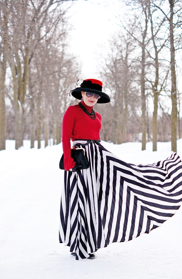 red top with flowing white and black skirt