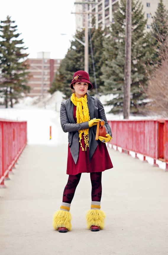 Red dress, black jacket, yellow scarf and boots
